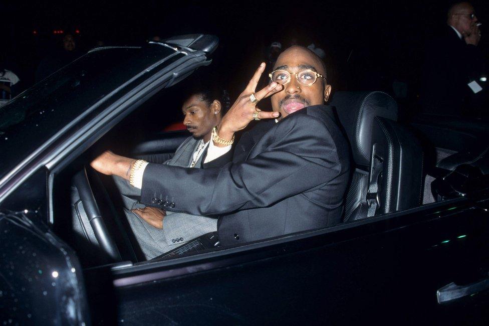 Here Shakur (right) is seen with Snoop Dogg at the 23rd annual American Music Awards in January 1996