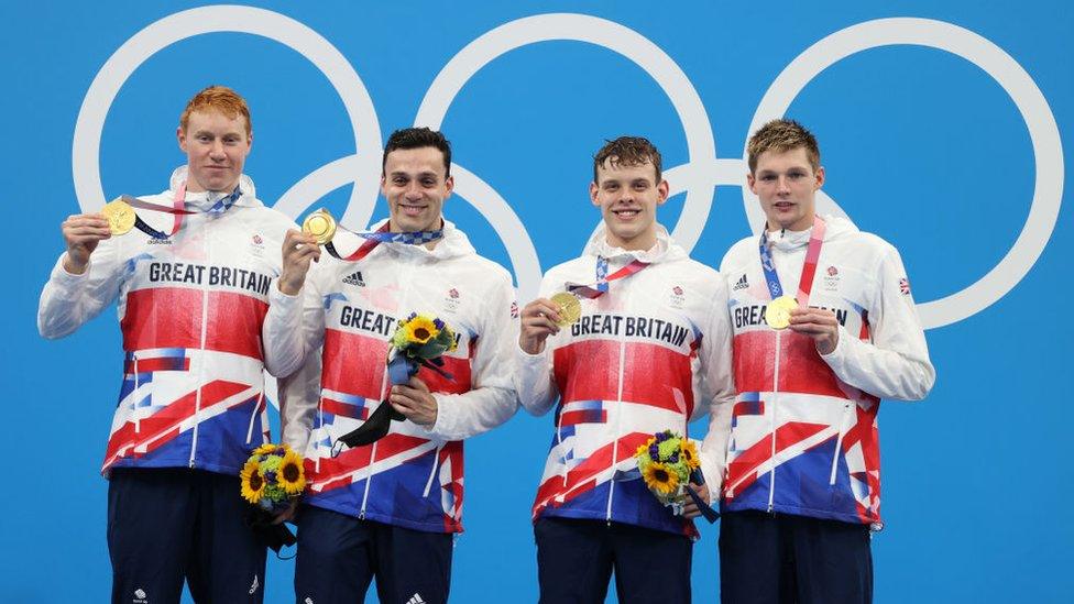 Left to right: Tom Dean, James Guy, Matthew Richards and Duncan Scott of Team Great Britain pose with their gold medals during the medal ceremony for the Men's 4 x 200m Freestyle Relay Final on day five of the Tokyo 2020 Olympic Games at Tokyo Aquatics Centre on July 28, 2021 in Tokyo, Japan