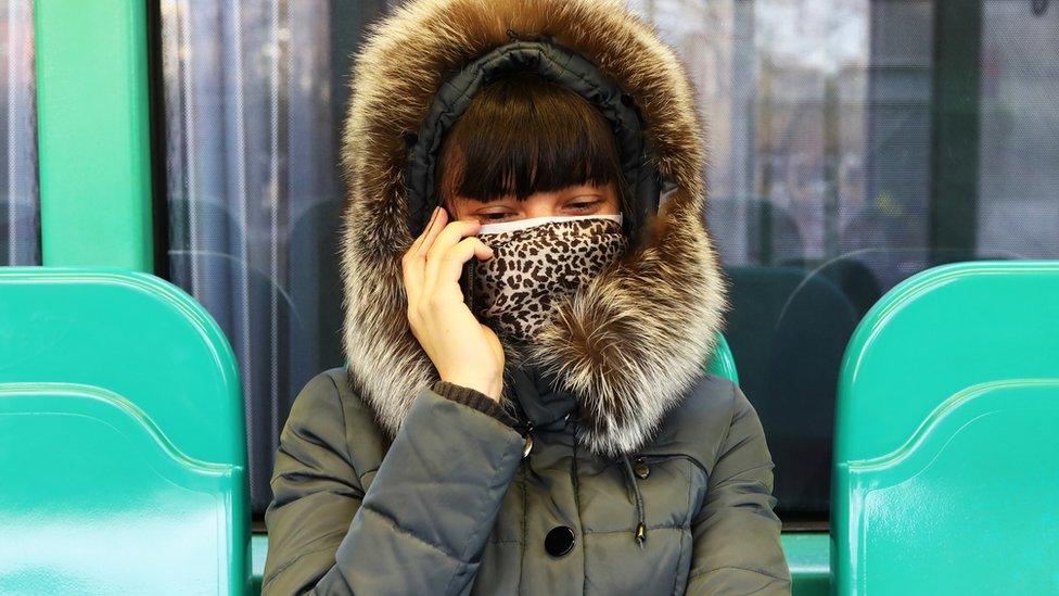 woman in mask in milan