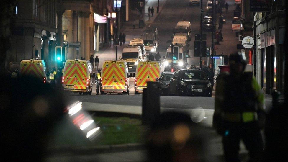 Police vans near College Green