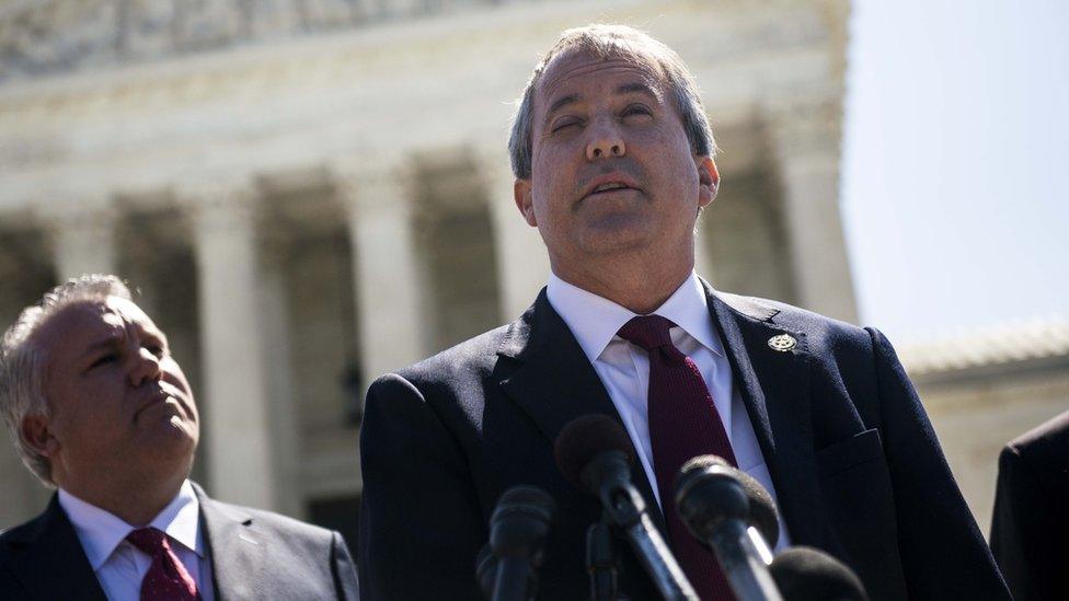 Texas Attorney General Ken Paxton speaks to reporters outside the Supreme Court on June 9, 2016