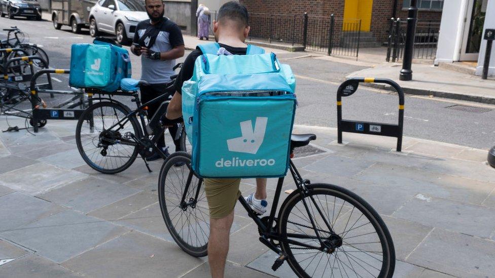 Deliveroo riders taking a break