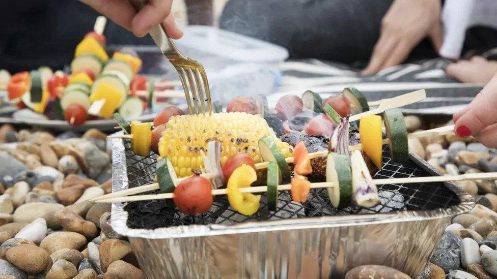 Food on a disposable barbecue