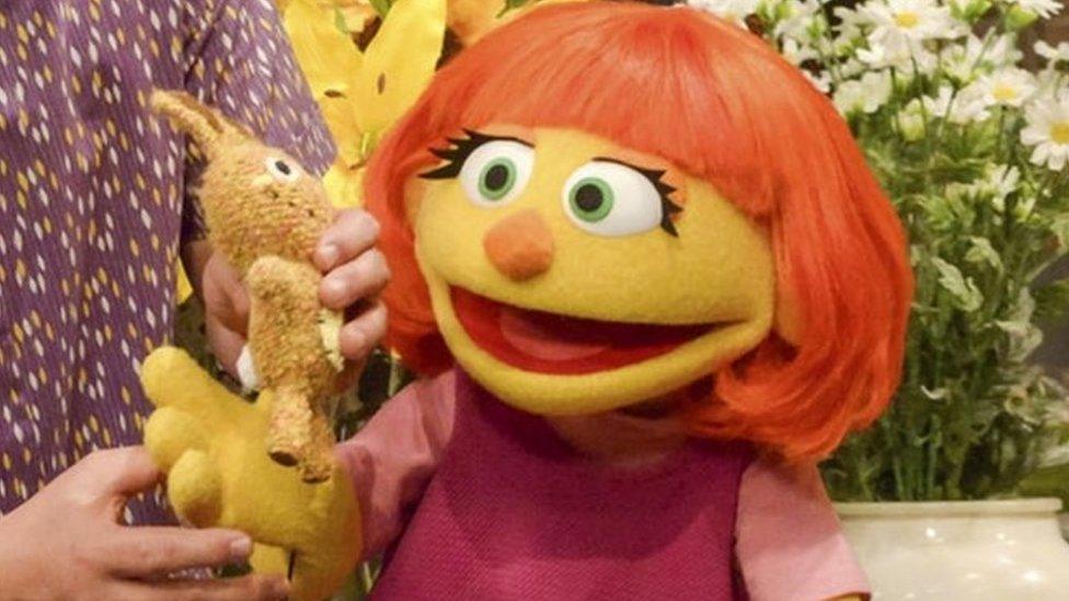 This image released by Sesame Workshop shows Julia, a new autistic muppet character debuting on the 47th Season of "Sesame Street," on April 10, 2017, on both PBS and HBO.