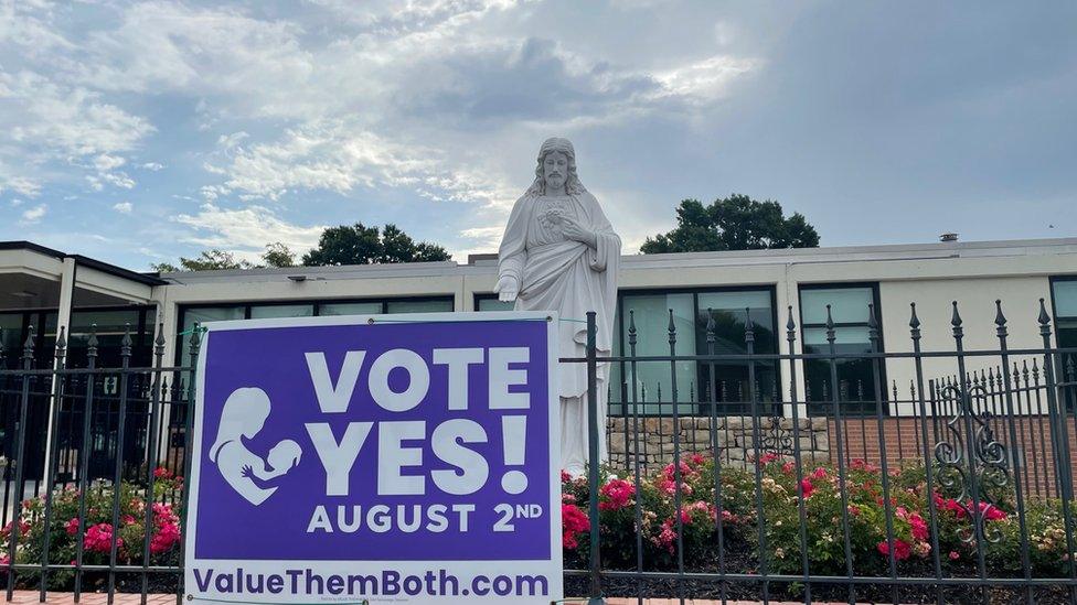 Political poster outside church