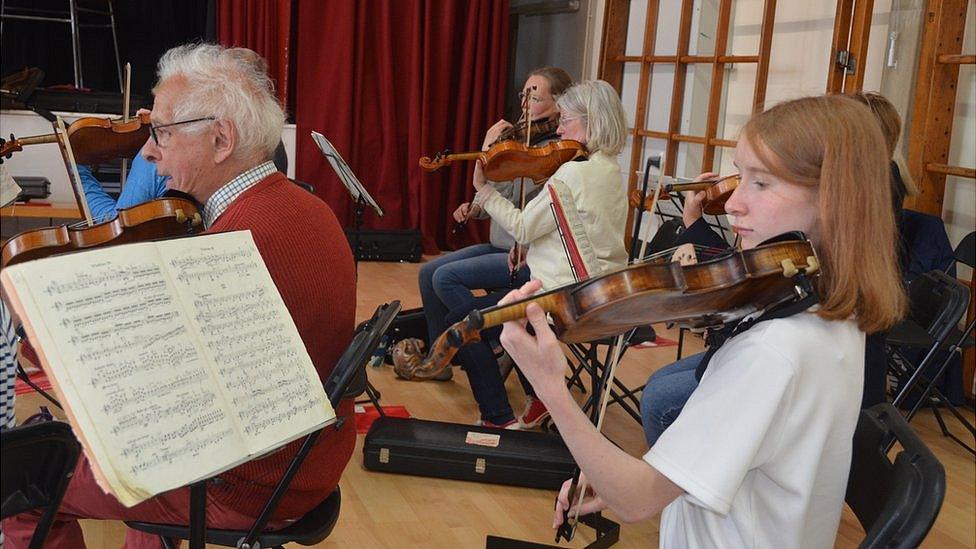 Natasha playing with the orchestra