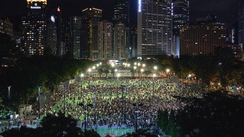 Protesters hold their candles during a moment of silence on the 31st Anniversary of the Tiananmen Massacre.