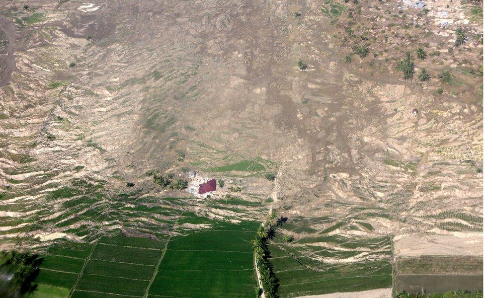 Aerial view of a collapsed hillside in Palu