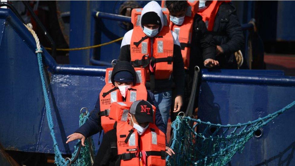 Migrants picked up by a Border Force boat