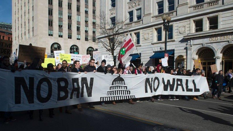 Protesters march up Pennsylvania Avenue in Washington