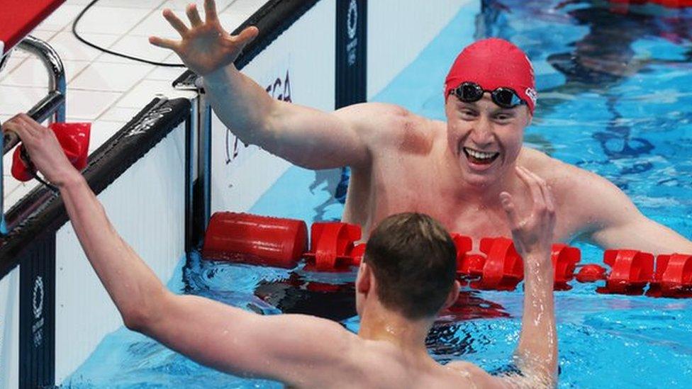 Tom Dean and Duncan Scott celebrate