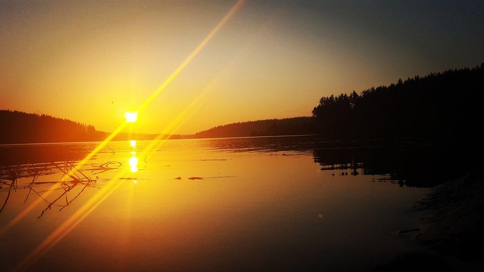 A sunset over Alwen Reservoir in Conwy county.