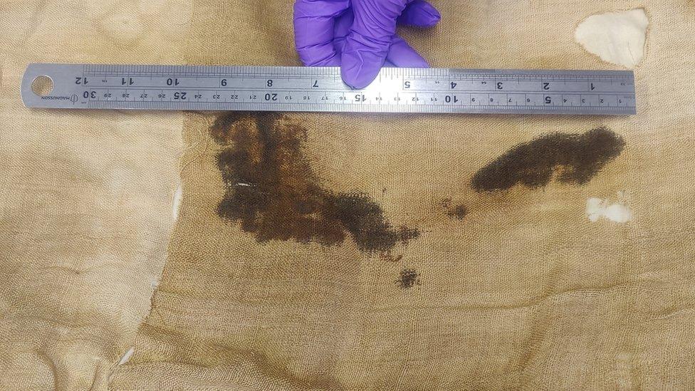 A close up photo of what we believe is a footprint from the embalmer who worked on Irtyru’s body