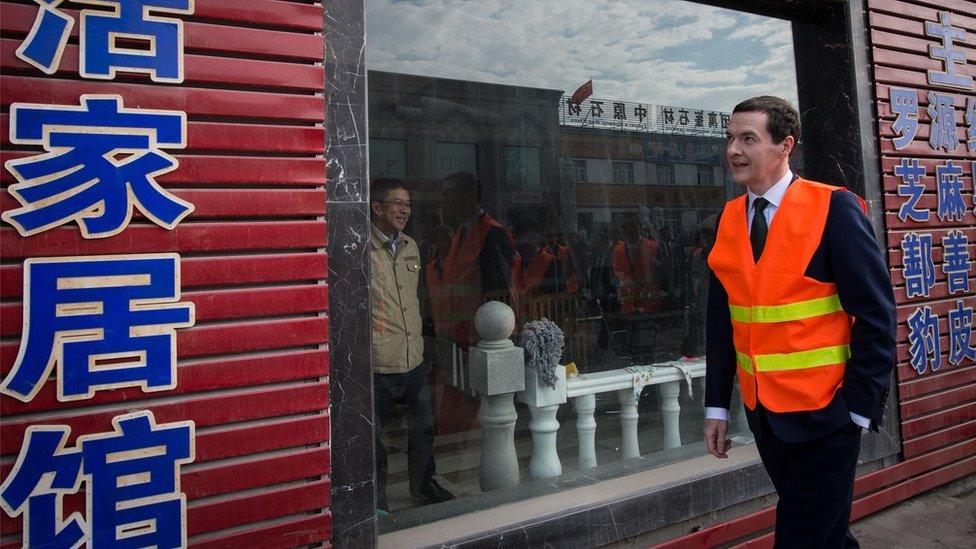 Chancellor of the Exchequer George Osborne visits an industrial area in the city of Urumqi in north west China - 23 September 2015