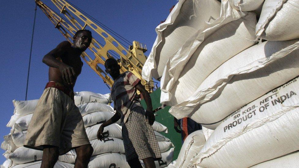 Seamen supervise off-loading operations at the DP World operated Port of Djibouti, November 2006