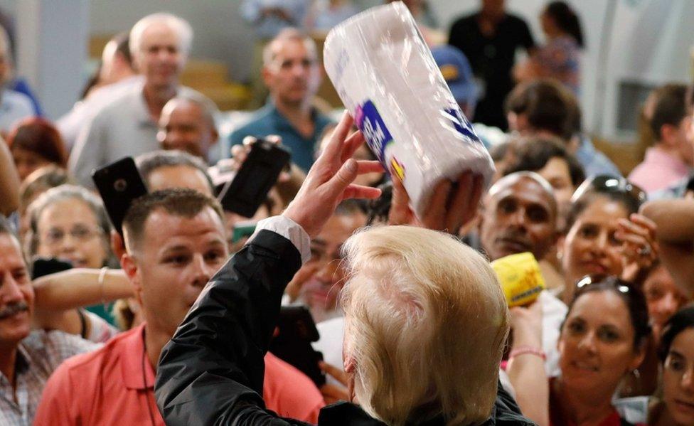 Trump handing out goods