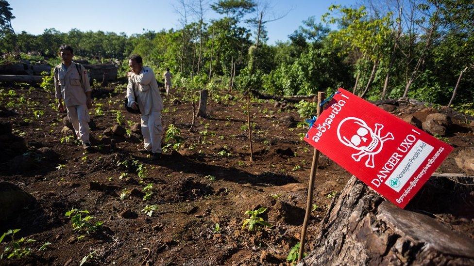 UXO personnel prepare for an ordnance demolition in Laos (December 2014)