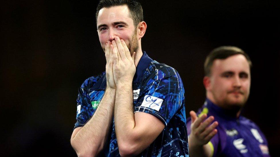 Luke Humphries celebrates winning the PDC World Darts Championship