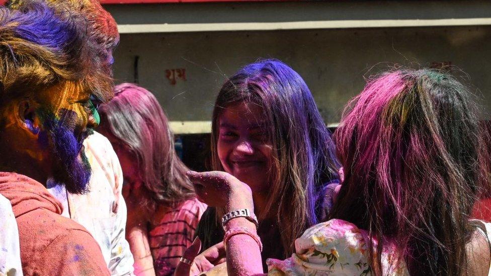 NEW DELHI, INDIA - MARCH 6: Students play holi with colors and Gulal in front of YMCA on March 6, 2023 in New Delhi, India.