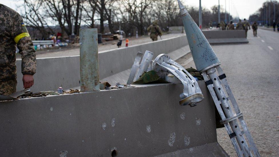 The casing of a Russian cluster bomb rocket is seen in Mykolaiv, 10 March 2022.