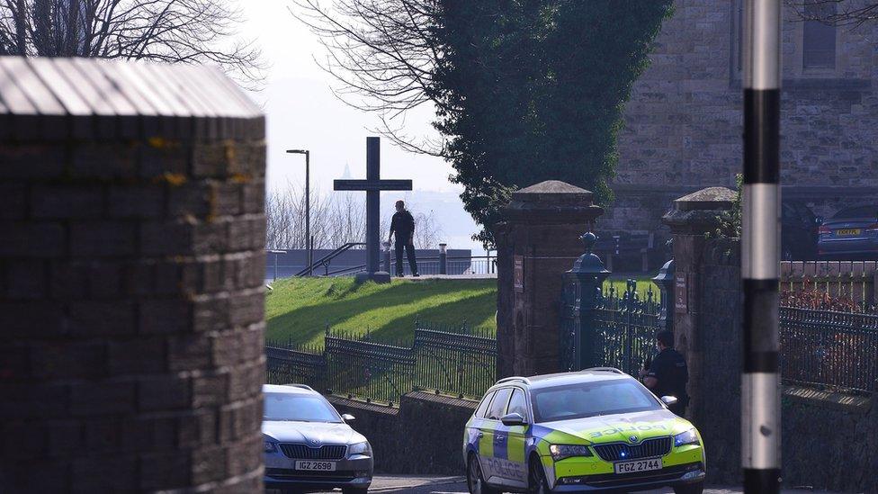 Police at the Crumlin Road site