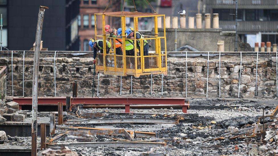 Workmen at the GSA site