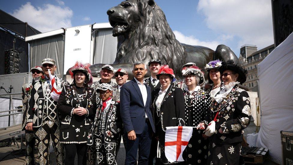 London Mayor Sadiq Khan poses with members of Pearly Kings and Queens of London during St George"s Day celebrations