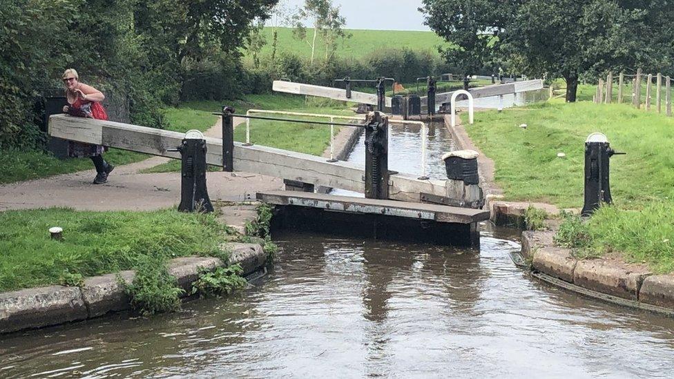 Carol Ellis closing a lock