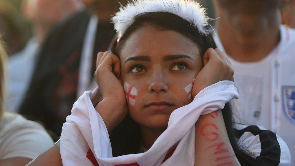 girl looks sad at football world cup