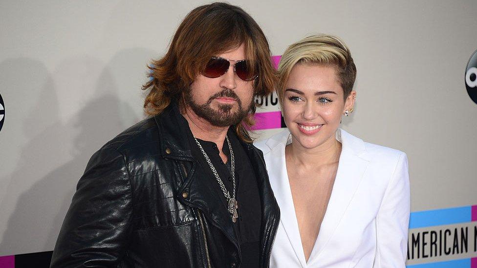 Miley Cyrus with her dad Billy Ray