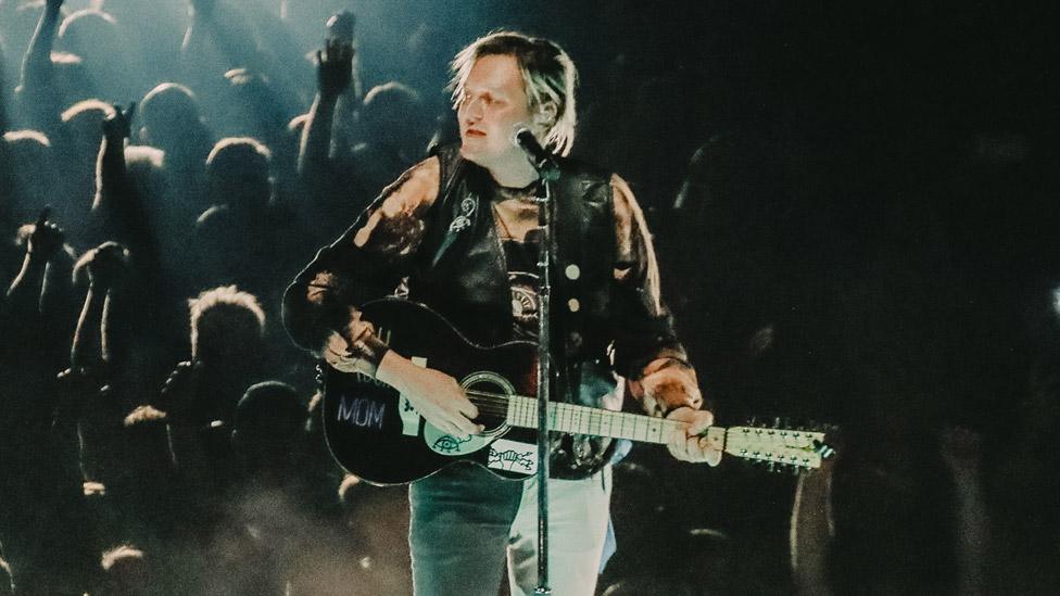 Arcade Fire frontman Win Butler on stage in Dublin on 30 August