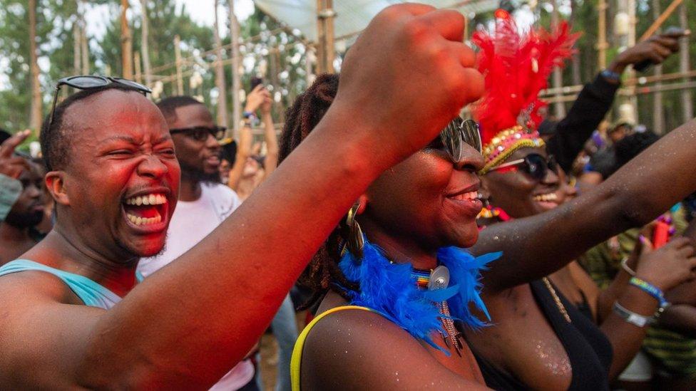 Ugandan Nyege Nyege festival-goers enjoy music played by Lady Hash at the Itanda Falls on the Day two of Nyege Nyege festival, the annual four-day international music festival, in Jinja, Uganda on September 16, 2022