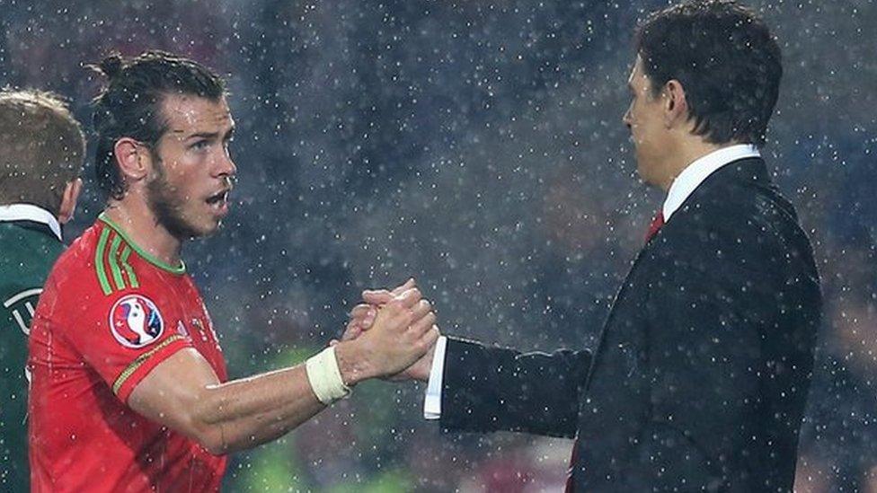 Gareth Bale is greeted by Wales manager Chris Coleman