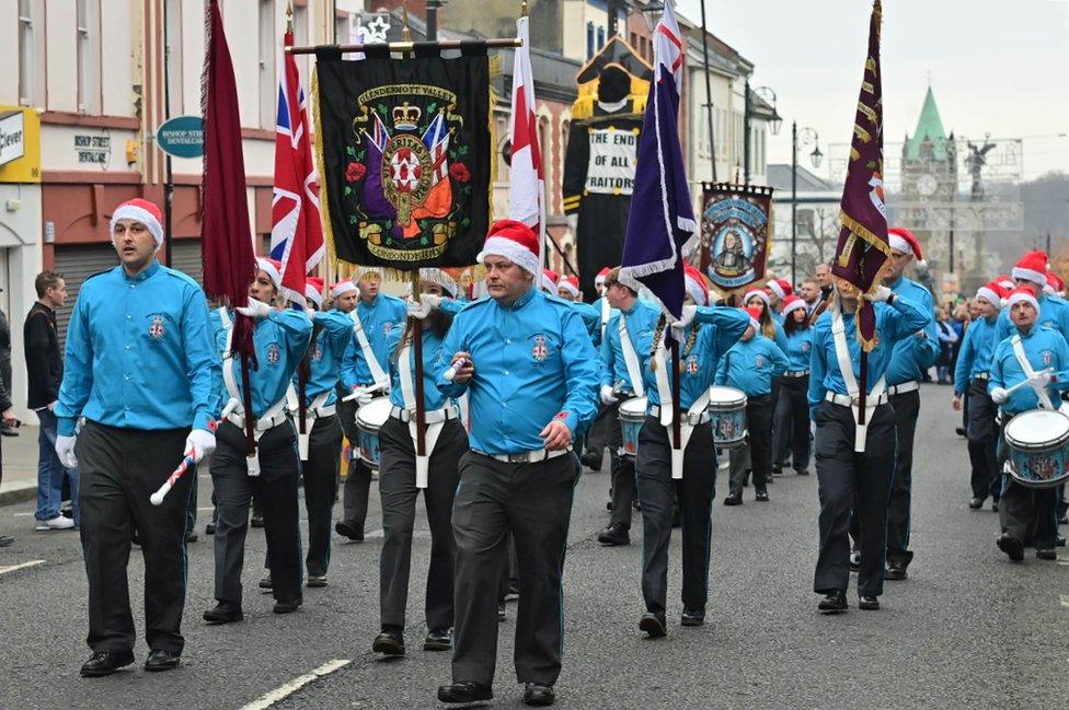 The Glendermott Valley Flute Band marches during the Apprentice Boys parade in Londonderry