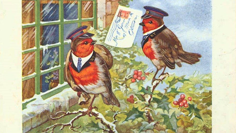 A Christmas card featuring 'robin redbreasts' dressed as postmen