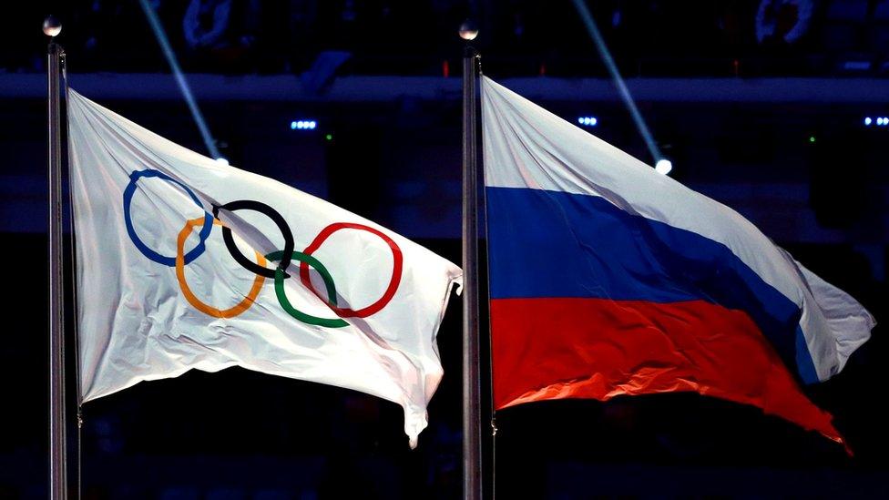 Russian and Olympic flags