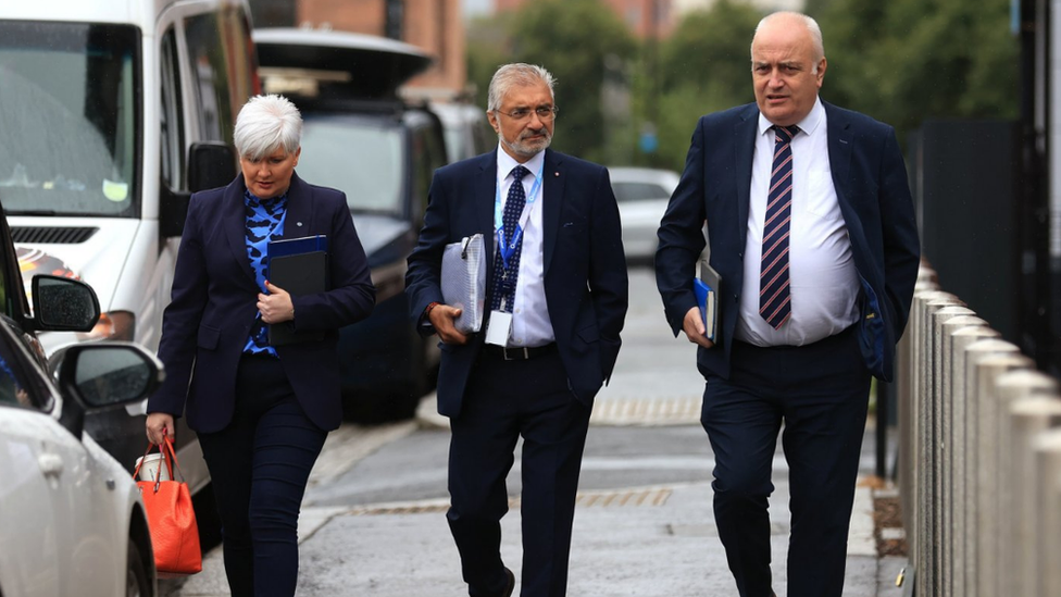 DUP Policing Board members Joanne Bunting (left) and Trevor Clarke (right) attended Thursday's meeting along with independent Policing Board member Mukesh Sharma