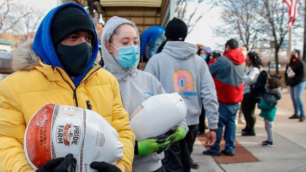 Volunteers giving out turkeys ahead of Thanksgiving in Chicago, Illinois