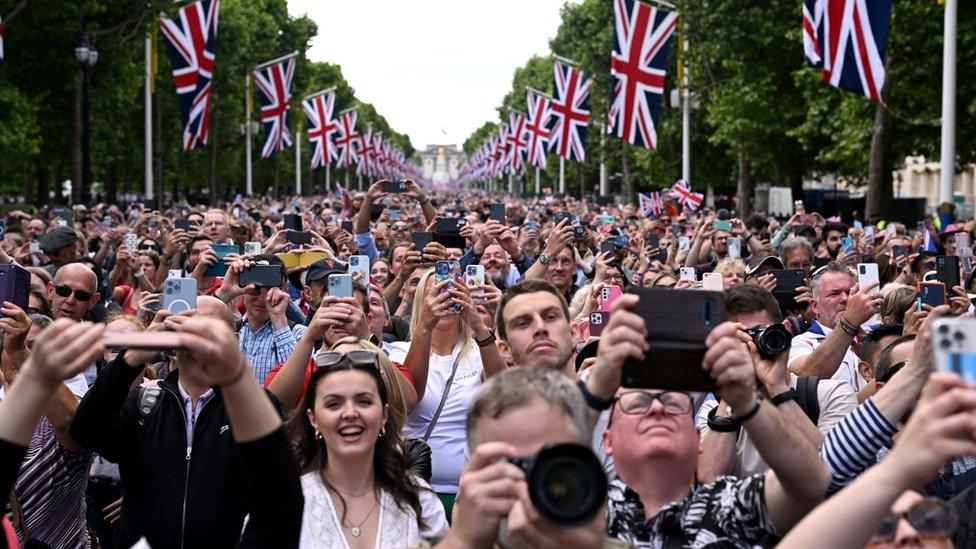 Crowds watching the flypast on The Mall