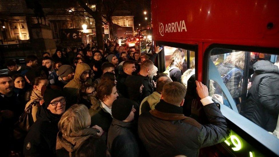 People boarding bus