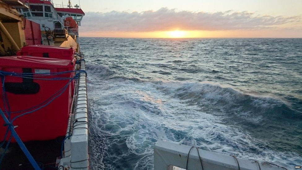 Sun setting over the choppy seas of the Southern Ocean.
