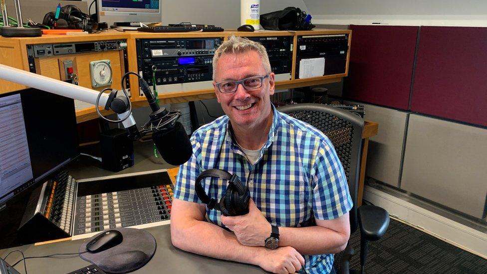 Cameron Stout in radio studio