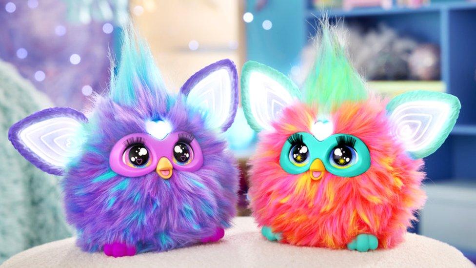 Next generation Furby in purple and coral colours.