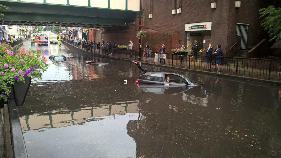 Three cars submerged under water