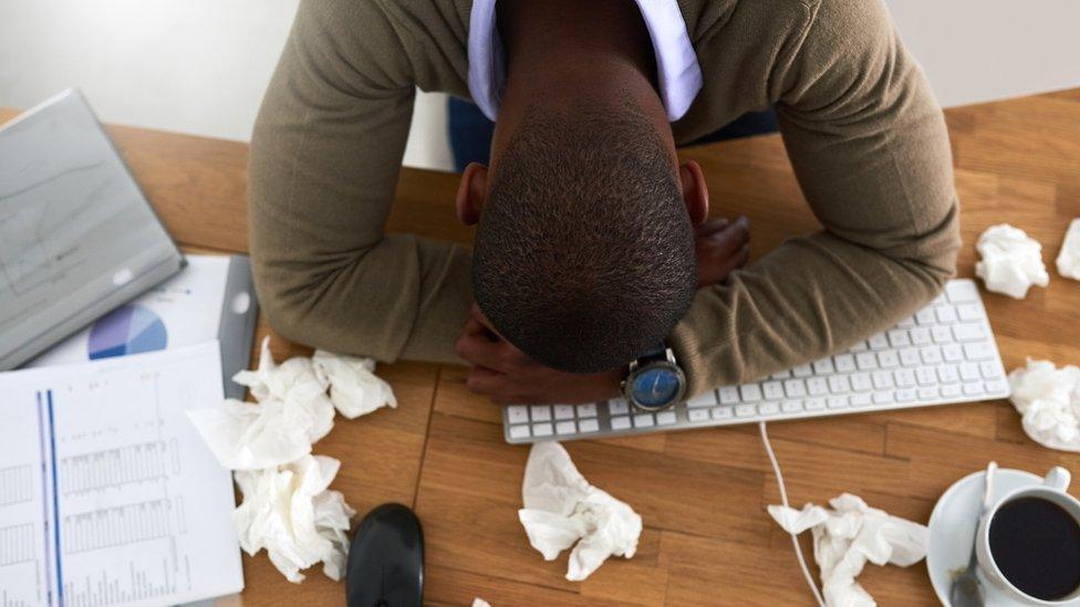 Man asleep at desk