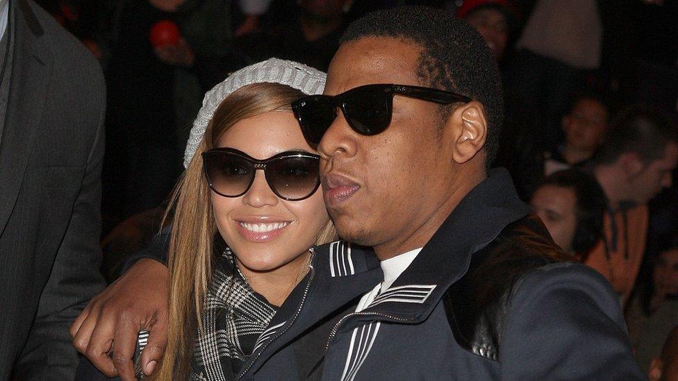 Rapper Jay-Z (L) and singer Beyonce Knowles sit in the audience during the 58th NBA All-Star Game, part of 2009 NBA All-Star Weekend at US Airways Center on February 15, 2009