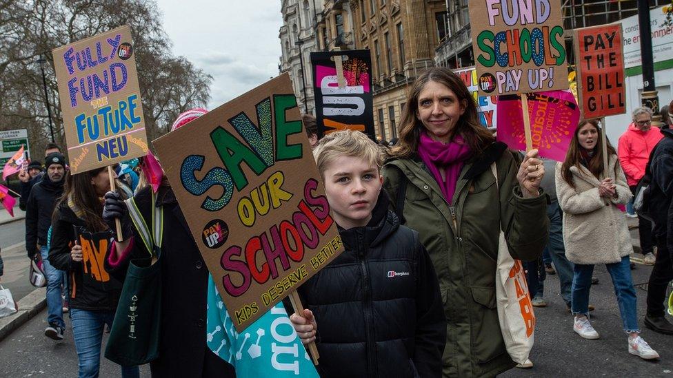 Child with placard