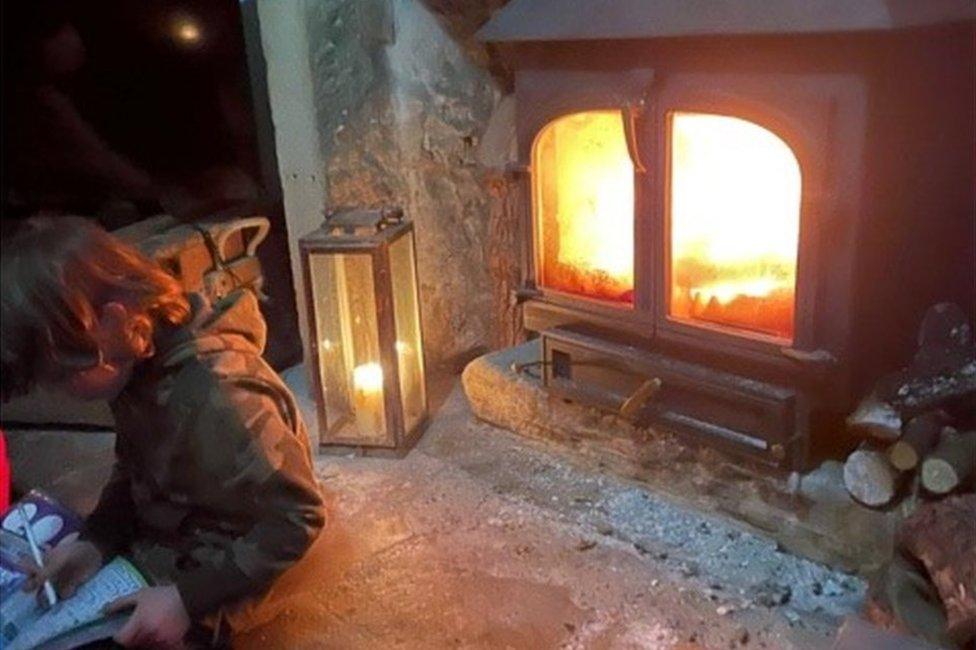 Child in front of stove