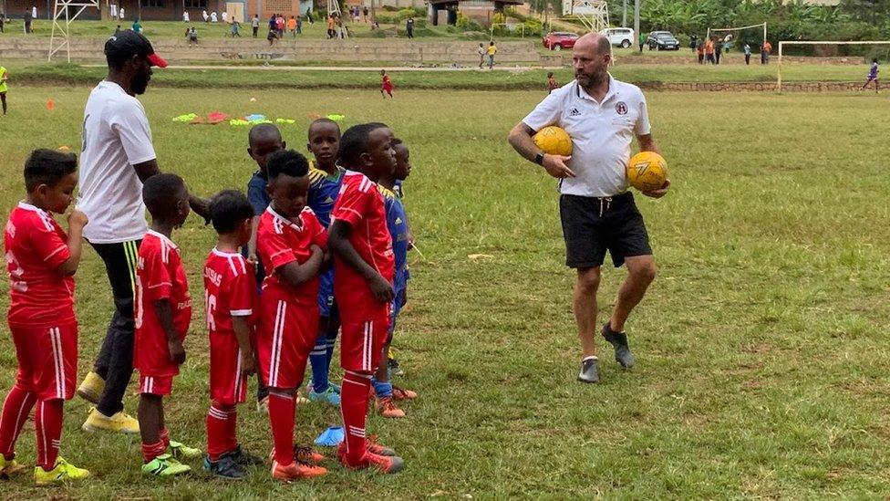 Youngsters line up ahead of a coaching session