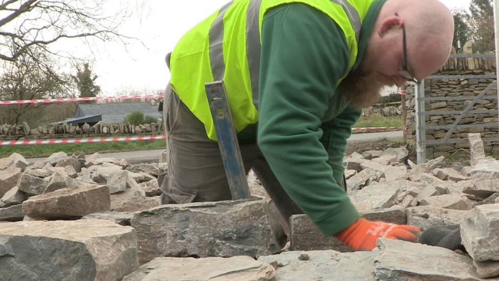 Shane O'Hare working on a traditional dry stone wall